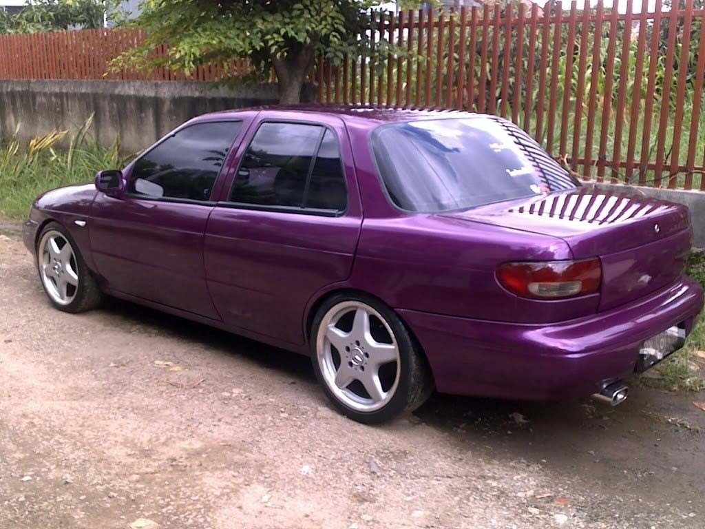 mobil sedan legenda timor dohc 2001 warna ungu